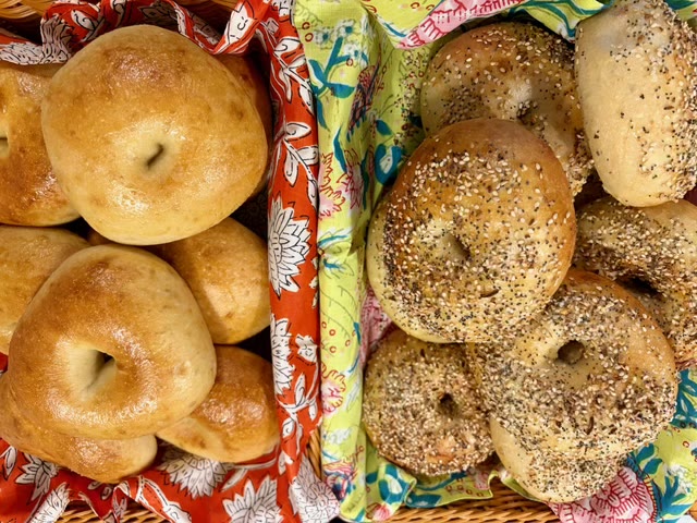Basket of plain and everything bagels